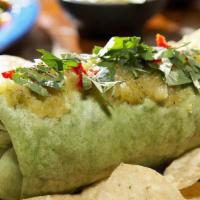 Pineapple Jerk Burrito · Jerk chicken or tofu sautéed with pineapple salsa and roasted red peppers, rolled in a torti...