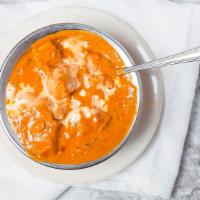 Chicken Tikka Masala · Boneless morsels of chicken grilled and cooked in tomato and cream sauce, flavored with fenu...