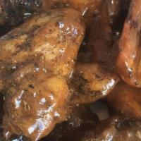 Wings (10 Pieces) · TDT's famous wings. These crowd-pleasing wings are big and juicy because they're brined over...