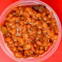 Baked Beans With Meat · Our signature baked beans seasoned with molasses, bacon and beef. Can't be beat.