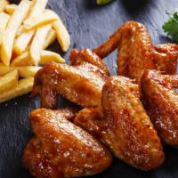 Hot Chicken Wings & Fries · Hot & Crispy Chicken wings fried to perfection and coated in spicy Hot seasoning. Served in ...