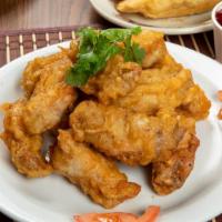 Honey Mustard Chicken Wings & Fries · Hot & Crispy Chicken wings fried to perfection and coated in Honey Mustard seasoning. Served...