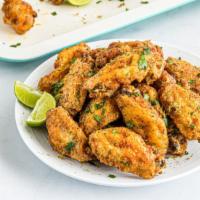 Lemon Pepper Chicken Wings &
Fries · Hot & Crispy Chicken wings fried to perfection and coated in Lemon Pepper seasoning. Served ...