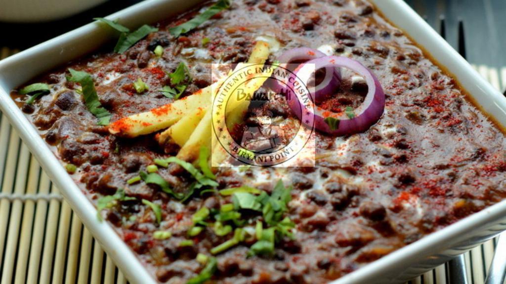 Dal Makhani (Bawarchi Special) · Urad beans simmered in creamy gravy sautéed with tomatoes-onions and mild spices.