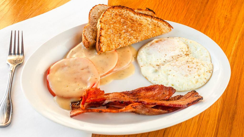 Big Bad Breakfast Plate · Two eggs with your choice of protein. Served with your choice of side and bread.
