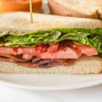 Big Bad Blt · Mild or spicy BBB bacon, romaine, tomato, and mayo on white or wheat toast. Served with your...