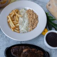 Picanha · Prime top sirloin cap served with rice, black beans, fries, yucca flour 