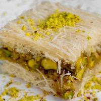 Ballorieh · A traditional dessert made with a rich pistachio filling sandwiched between delicious rose-i...
