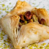 Pistachio Bird'S Nest · A baklava variety consists of layered rectangular sheets of phyllo dough that are filled wit...