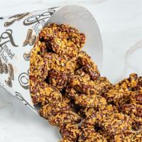 Ferrero Rocher Pecans · Pecans covered in a Ferrero Rocher coating.