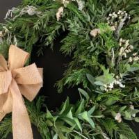 16 In. Winter Wonderland Wreath · This wreath includes eucalyptus, pine, white filler, silver accents and a neutral bow. Great...