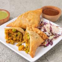 Vegetable Samosa · Crisps patties with potatoes and peas with a little Indian spice.