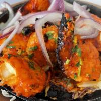 Tandoori Prawns · Mildly spiced shrimp cooked in tandoor.
