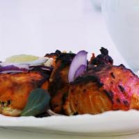 Chicken Malai Kebab · Mildly marinated chicken thigh cooked in tandoor.