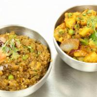 Aloo Gobi · Traditional North Indian preparation with fresh herbs, potatoes, cauliflower, tomatoes and p...