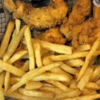 Chicken Tenders · Chicken tenderloin battered, lightly breaded, and fried to golden brown, served with fries a...