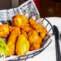 Good-To-The-Bone Jumbo Chicken Wings · Deep fried to a perfect golden brown and tossed in your favorite sauce.
