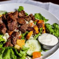 Black & Blue · Grilled or fried beef tenderloin placed on our delicious salad mix, topped with croutons, to...