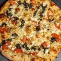 Haole - Sid'S White Pizza · Spinach, olive oil, garlic, mozzarella, feta cheese, tomatoes and Italian spices.