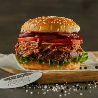 Bbq Pulled Pork Burger · Black Angus ground beef burger on a sesame bun topped with lettuce, tomatoes, onions, and BB...