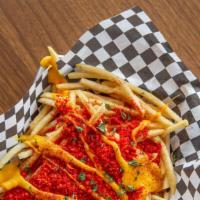 Xxtra Flamin Hot Cheetos Cheese Fries · Fries with melted cheese, topped with extra flamin cheetos.