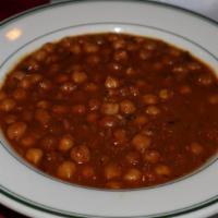 Channa Masala · Chick peas and fresh tomatoes cooked in traditional spices.