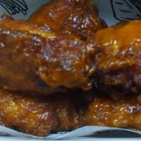 10 Piece Wings Combo · 10 piece party wings with a sauce of your choosing. Includes 1 dipping sauce, Bleu cheese or...