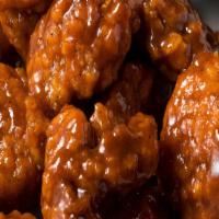 15 Piece Boneless Wings · 15 Pieces of boneless chicken breaded and deep fried. Includes 2 dipping sauce, blue cheese ...