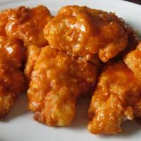 6 Piece Boneless Wings · 6 pieces of boneless chicken breaded and deep fried. Includes 1 dipping sauce, blue cheese o...