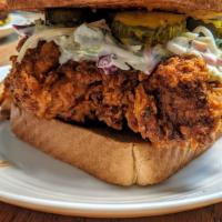 Nashville Hot Chicken Sandwich Combo · Fried chicken dipped in nashville hot sauce, lettuce, tomato, pickles, house sauce and mayo ...