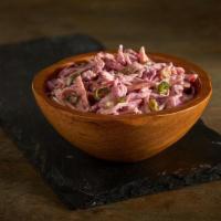 Spicy Coleslaw Salad · Freshly shaved cabbage, carrots, and chives in our homemade Cayenne pepper spicy mayonnaise ...