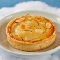 Pear Almond Utopia  · A summer classic pear tart baked with a rum flavored almond cream and toasted almonds.