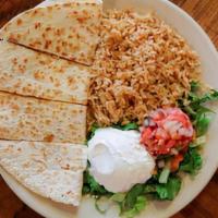 Grilled Chicken Quesadilla · Sautéed poblano peppers, onions, mexican cheese, and grilled chicken in a large flour tortil...
