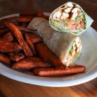 Chipotle Chicken Wrap · Flour tortilla filled with grilled chicken breast strips, fried onions and jalapeños, lettuc...