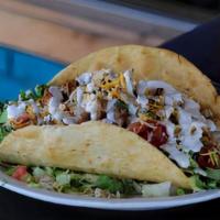 Super Taco · Giant taco with crispy flour tortilla filled with lettuce, cheese, pico, avocado, peppers, o...