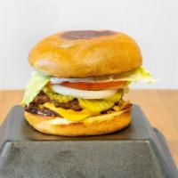 Burger · Our juicy burgers are seasoned and always cooked to order. Dive right into this 1/2 pound An...