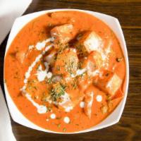 Paneer Tikka Masala · Homemade Indian cottage cheese cubes cooked with bell peppers, onions in tomato sauce with a...
