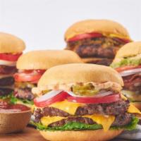 Classic Burger · Two four oz. patties, on a brioche bun with American cheese, lettuce, tomato, onions, pickle...