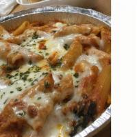 Baked Ziti Ricotta · Ziti pasta in home made tomato sauce, ricotta cheese, and melted mozzarella cheese on the to...