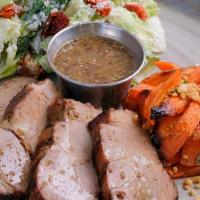Roasted Pork · Roasted pork with mojo mustard sauce. Served with your choice of any two sides.