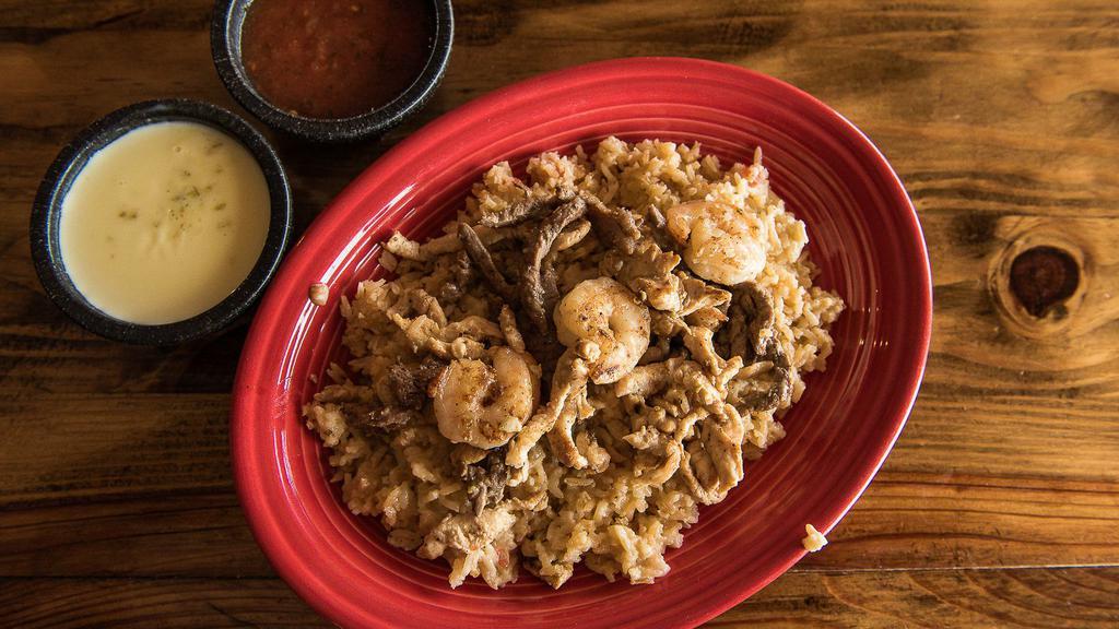 Grilled Chicken, Steak, Shrimp,
And Cheese Dip With Rice · 
