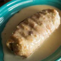 Chimichanga Shredded  Chicken · With cheese dip.
