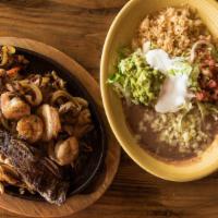 Special Santiago · Grilled chicken, steak, shrimp, chorizo, beef ribs and vegetables served with rice, beans, l...