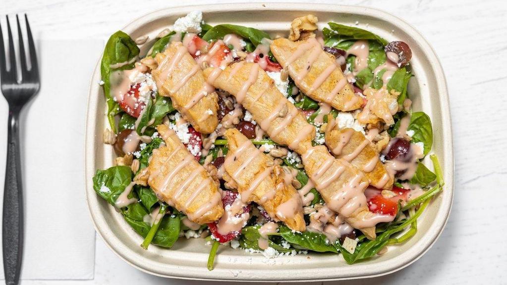 Spinach Salad · Spinach, Walnuts, Goat cheese, Strawberries, Grapes, Sunflower seeds, Creamy strawberry apple cider vinaigrette (+Add Grilled Chicken or Vegan 