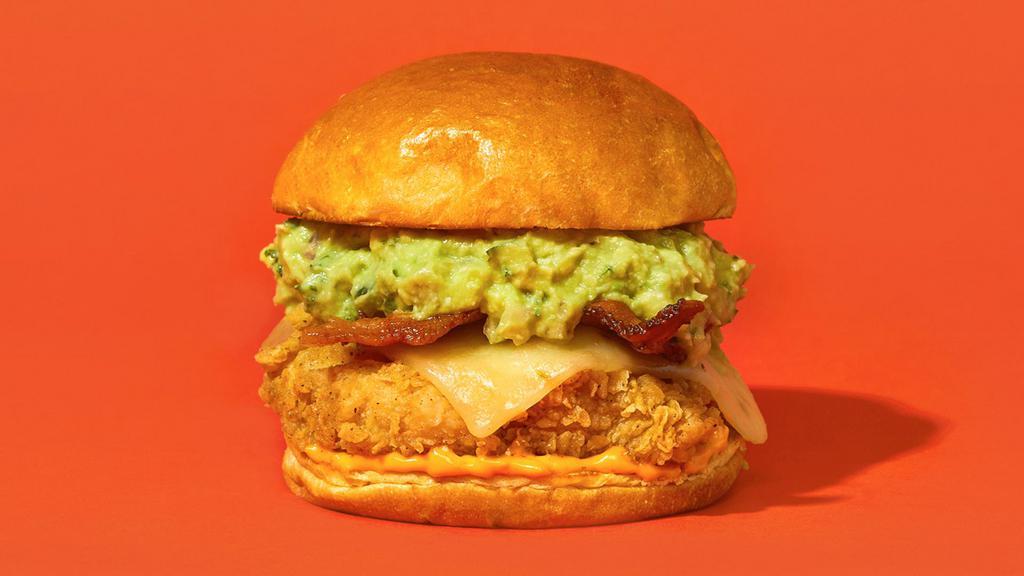 Holy Bacon Guacamole · Our signature fried chicken served on a toasted bun and topped with pepper jack cheese, bacon, guacamole, and mayonnaise.