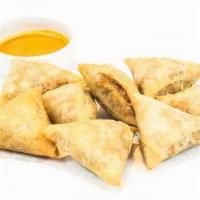 Samosa · Ubiquitous throughout India, our version of the popular vegetarian staple features mashed ch...