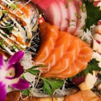 Sashimi & Sushi Combination · Six pieces of sashimi, four pieces of sushi, and one California roll.