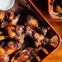 Wing Basket · Six wings and one side. Bonos wings are smoked in house, rubbed with our special seasoning, ...