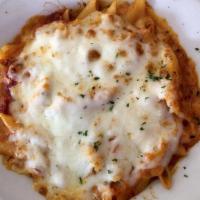Baked Ziti · Ziti pasta blended with ricotta and mozzarella cheese in our marinara sauce, then baked to p...