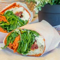 Warrior Wrap · Cold wrap with chicken, spinach, sun dried tomatoes, feta cheese, sunflower seeds, cranberri...